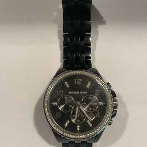Black Michael Kors watch with gems. Scratched  and needs new battery.